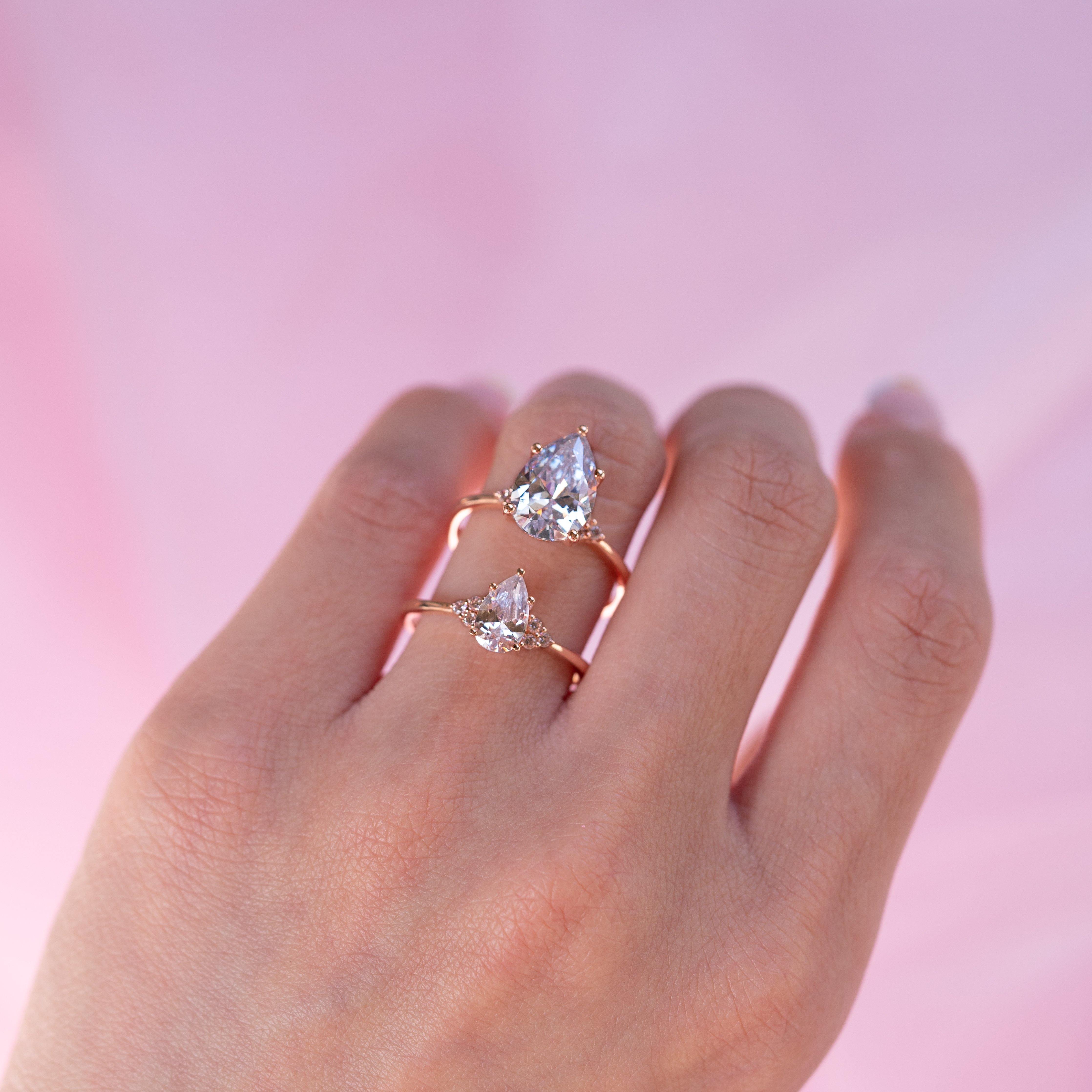 Dainty pear store shaped engagement ring